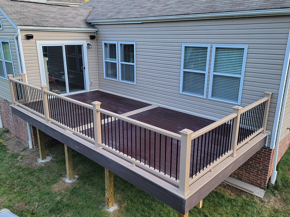 Large blue composite deck with white railings built by Oasis Custom Decks in Pittsburgh, PA